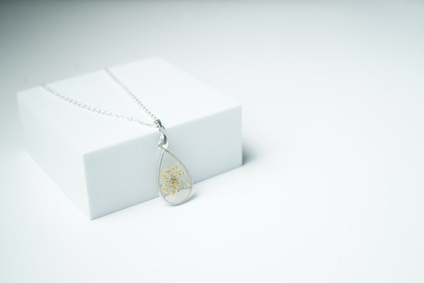 White  Annes With Silver Drop shape pendent