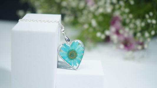 Heart of Silver with Blue Daisy Charm