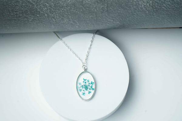 Light Blue Annes With Silver Oval shape pendent