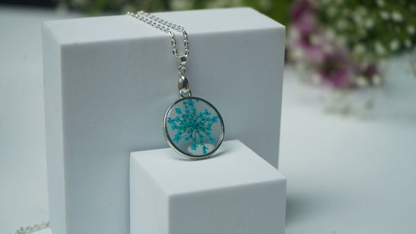 Light Blue Annes With Silver Round shape pendent