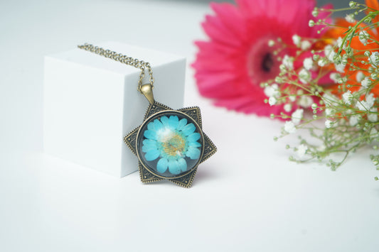 Light Blue Daisy With Antique Star pendent
